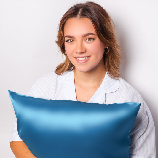 Model Holding Organic Azure Blue Silk Pillowcase For Skin and Hair
