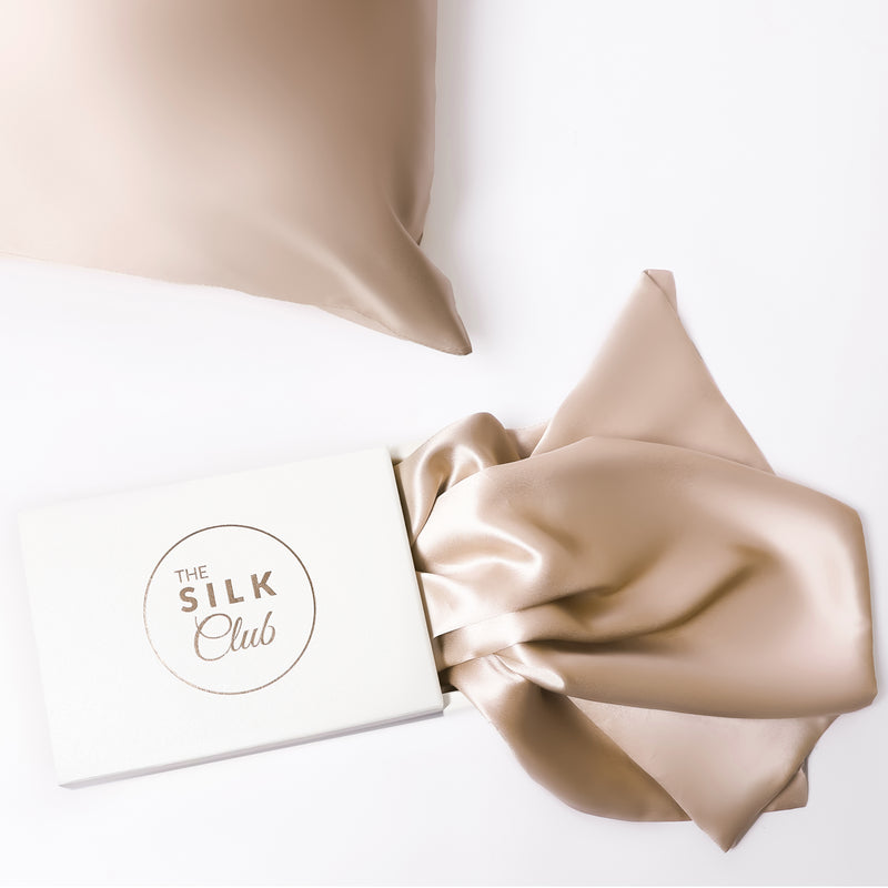 The Silk Club Champagne Silk Pillow close-up and Gift Box
