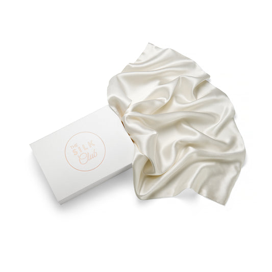 Cream Silk Pillow and Gift Box Close-Up - The Silk Club