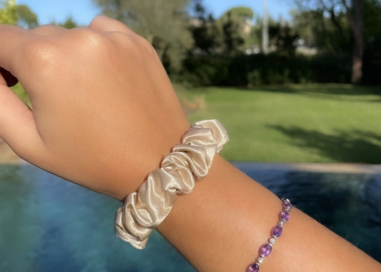 Small Champagne Silk Scrunchie On Model's Wrist