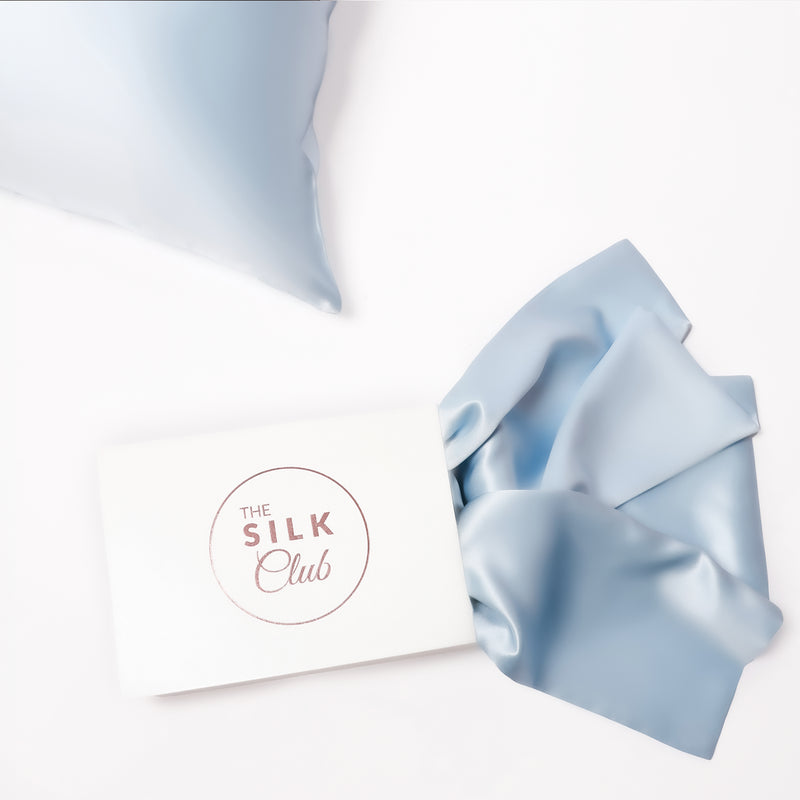 The Silk Club Coastal Blue Silk Pillow and Gift Box Close-Up