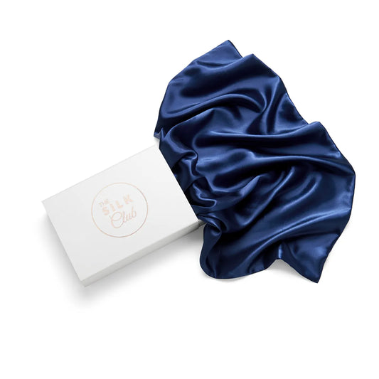 The Silk Club Navy Blue Silk Pillow and Gift Box Close-Up