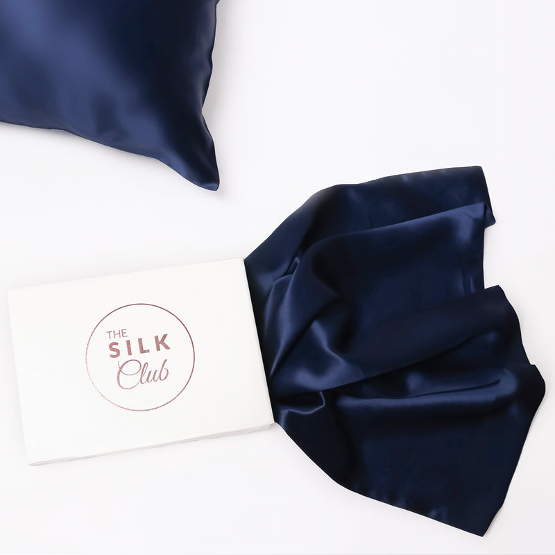 The Silk Club Navy Silk Pillow and Gift Box Close-Up