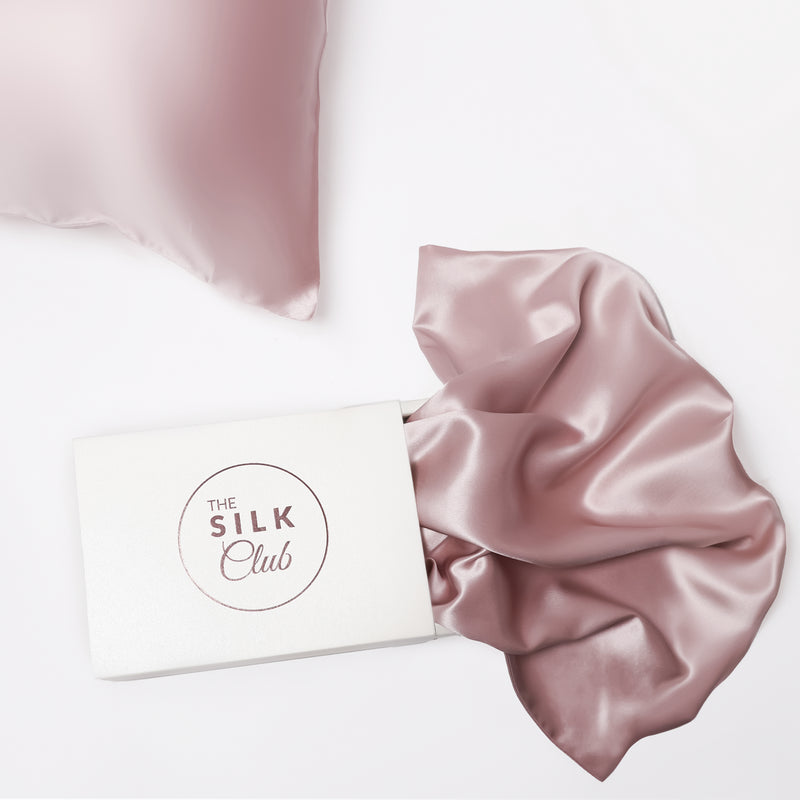 The Silk Club Rose Gold Silk Pillow and Gift Box Close-Up