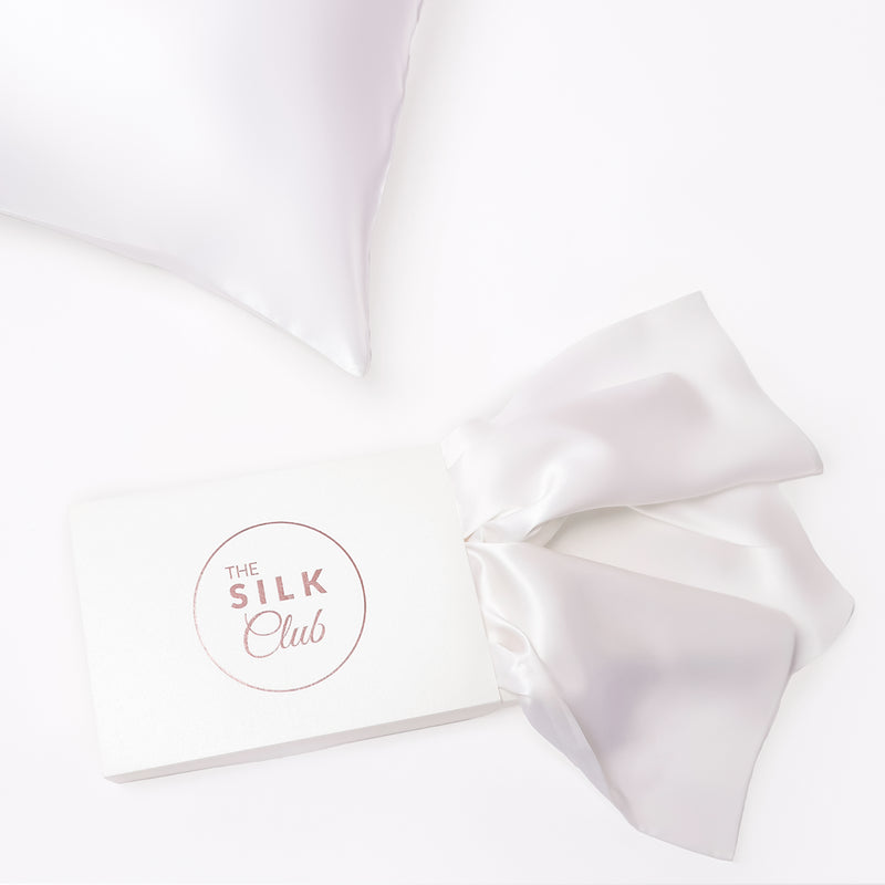 The Silk Club White Silk Pillow and Gift Box Close-Up