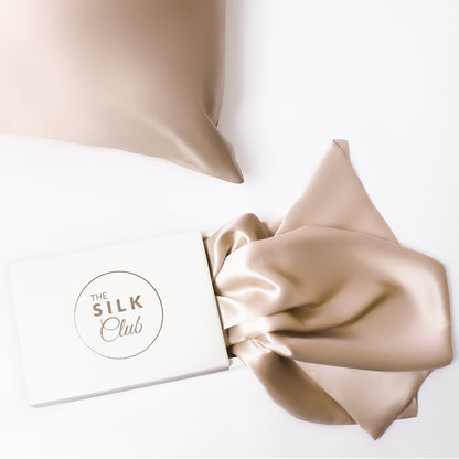 The Silk Club Champagne Silk Pillow close-up and Gift Box