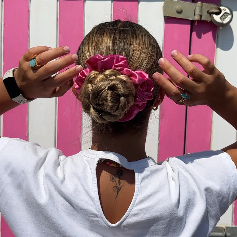 Model wearing a Flamingo Hot Pink Scrunchie Styled in a Plaited Bun
