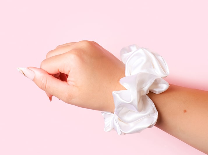 Model wearing Large White Silk Scrunchie On Wrist