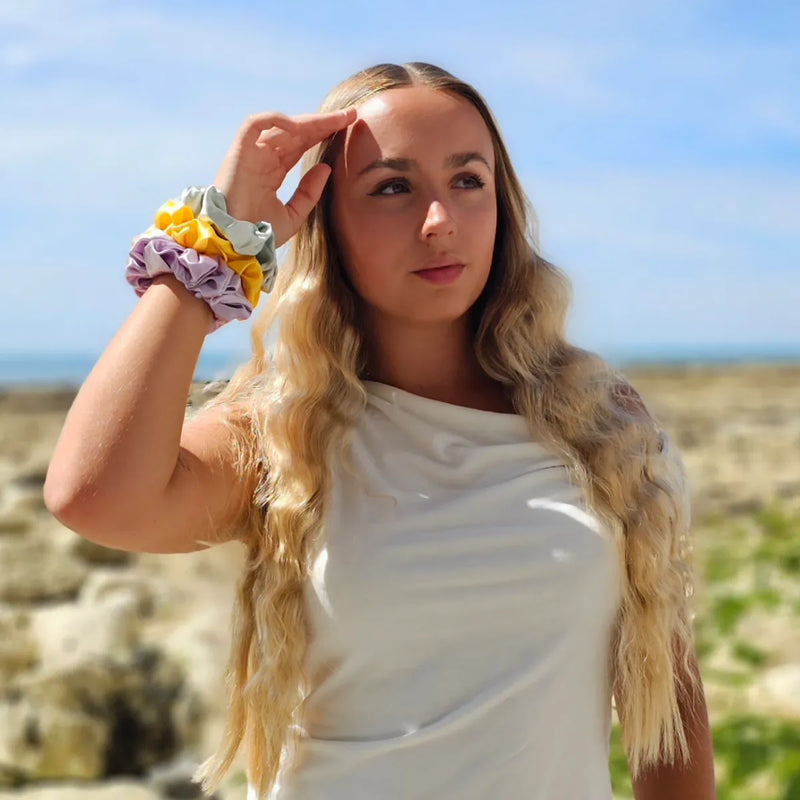 Model wearing the Wildflower Edit Silk Scrunchie Gift Set on Her Wrist