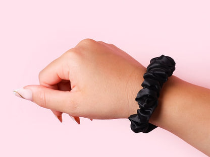 Model Wearing Black Small Silk Scrunchie On Wrist