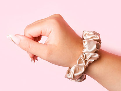 Model Wearing Regular Champagne Silk Scrunchie On Wrist