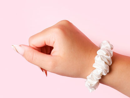 Model Wearing Small White Silk Scrunchie On Wrist