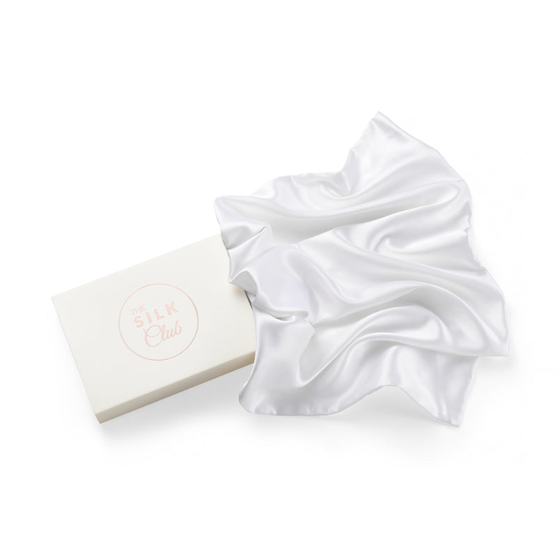 White Pure Silk Pillowcase Coming Out of Gift Box