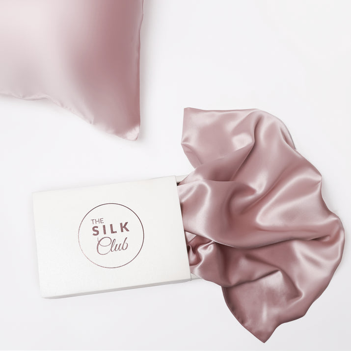 The Silk Club Rose Gold Silk Pillow and Gift Box Close-Up