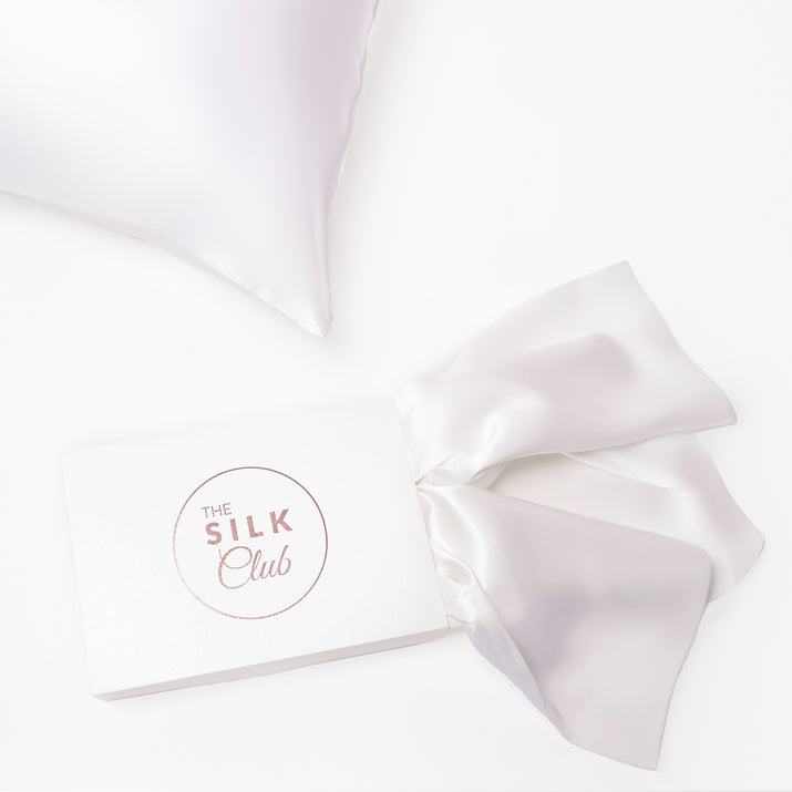 The Silk Club White Silk Pillow and Gift Box Close-Up